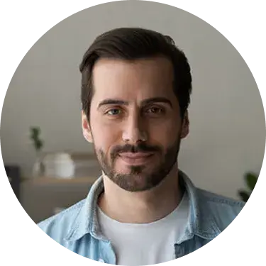 A smiling man with dark hair